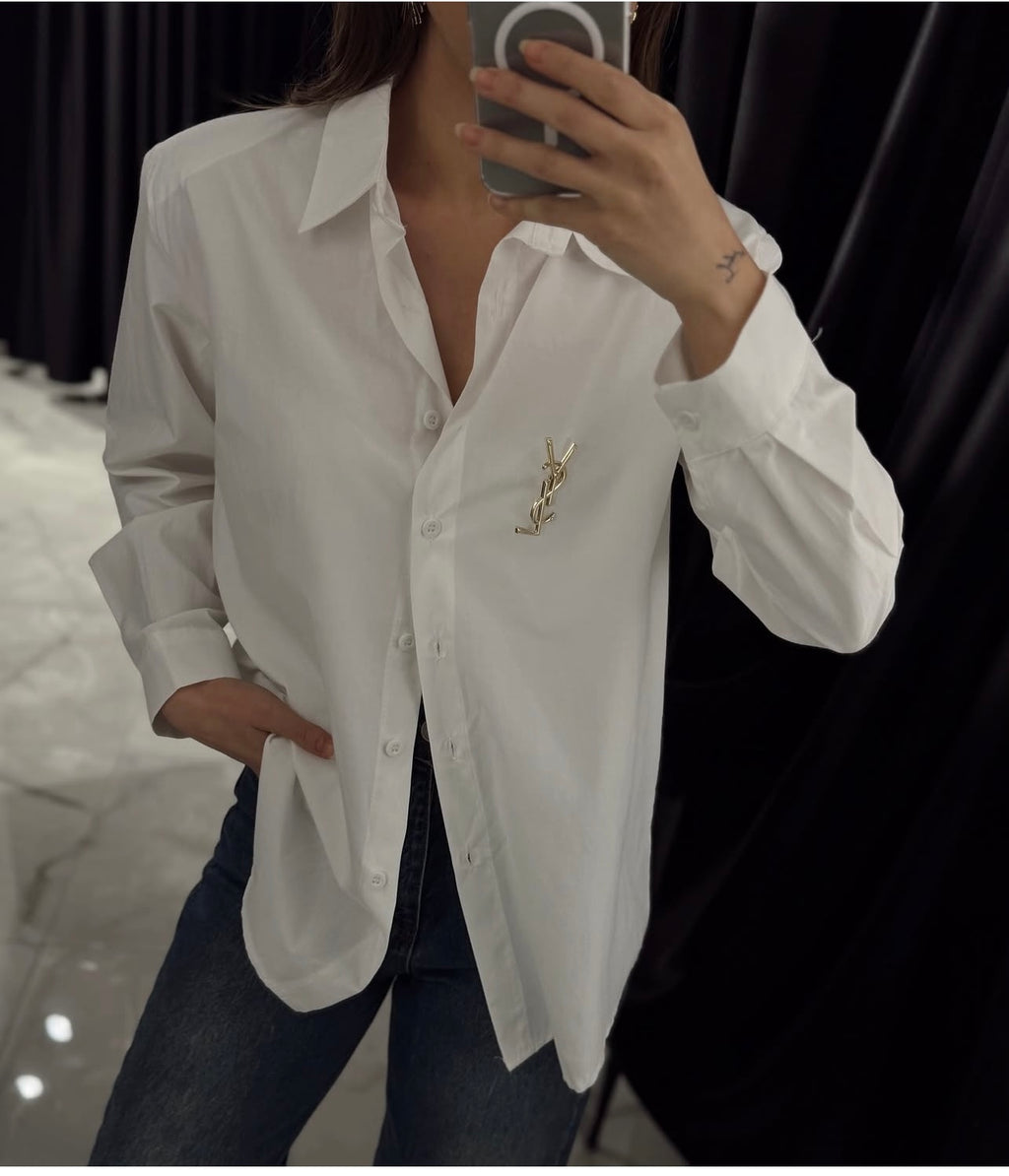 White shirt with brooch