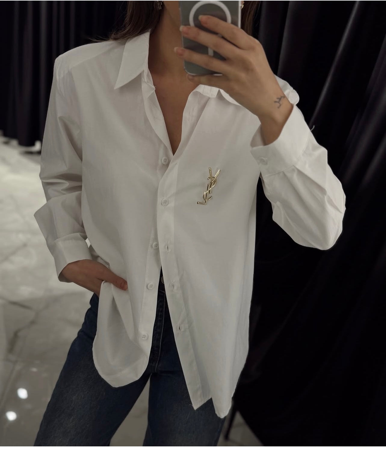 White shirt with brooch