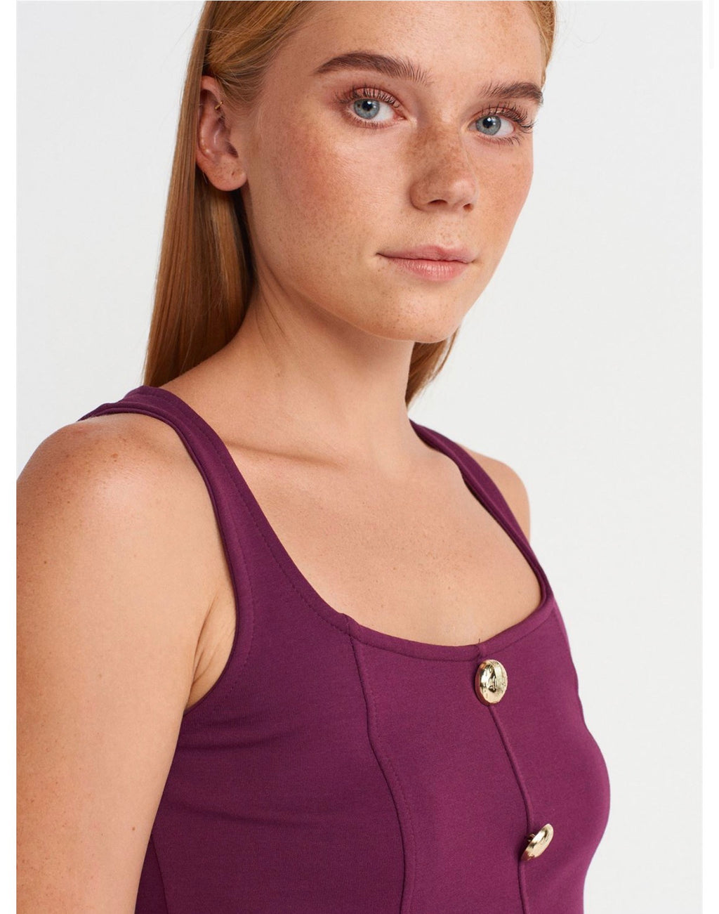 Purple/Yellow/olive green top